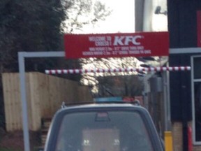 Craig Davies, @cpduke on Twitter, posted this photo on Tuesday of a hearse with a casket in the back trying to get into the drivethru of a KFC in England. He said the photo is genuine and said the hearse was actually too large to get around the posts, so the driver had to park and go into a Starbucks. (Photo: Craig Davies @cpduke/QMI Agency)