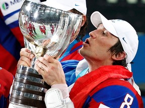 Russia's Alexander Ovechkin kisses the trophy during medal ceremony after their victory at the 2012 IIHF men's ice hockey World Championship final game with Slovakia in Helsinki May 20, 2012. (REUTERS/Grigory Dukor)