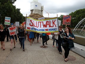 People march during the annual Slut Walk at the Alberta Legislature in Edmonton, Alberta on Saturday, July 27, 2013.  Perry Mah/QMI Agency