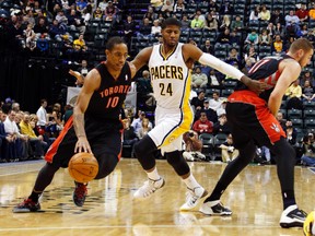 Raptors guard DeMar DeRozan drives against the Indiana Pacers on Tuesday night. (USA TODAY SPORTS)