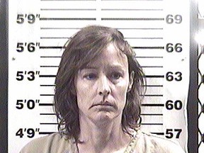 Jennifer McCarthy, 48, of Santa Fe, New Mexico, was charged on Saturday, January 4, 2014, with aggravated assault after she allegedly pulled a gun out of her private parts and pointed it at her boyfriend's head after the two had an argument about aliens. (Photo: Santa Fe County Jail/QMI AGENCY)