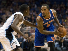 Orlando Magic shooting guard Victor Oladipo (5) guards New York Knicks shooting guard J.R. Smith (8) during the first half of the game at the Amway Center last month. (Rob Foldy-USA TODAY Sports)