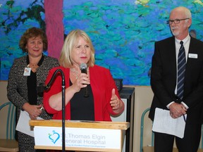 Ontario Minister of Health and Long-term Care Deb Matthews speaks at the official opening of St. Thomas Elgin General Hospital's new mental health program on Wednesday. Matthews spoke in part about her mother's grandmother, who lived at a psychiatric hospital in Hamilton. Flanking Matthews are Dr. Gillian Kernaghan, president and CEO of St. Joseph's Health Care London, and STEGH CEO Paul Collins. Ben Forrest/Times-Journal