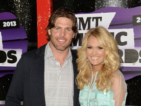 Mike Fisher and Carrie Underwood appear at the 2013 CMT Music awards at the Bridgestone Arena on June 5 in Nashville, Tennessee.