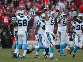 Carolina Panthers middle linebacker Luke Kuechly (59) celebrates with his teammates after an interception by cornerback Drayton Florence (29, not pictured) during the fourth quarter against the San Francisco 49ers at Candlestick Park. The Panthers defeated the 49ers 10-9 earlier this season. (Kyle Terada-USA TODAY Sports)