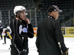 Kingston Frontenacs coach Todd Gill and defenceman Mike Moffat watch the power play at work during a practice earlier this season at the Rogers K-Rock Centre. (Ian MacAlpine/The Whig-Standard)