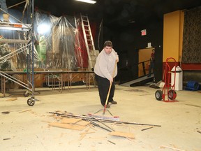 Mark Mannisto, former executive director of Theatre Cambrian, cleans the basement area of the theatre that was damaged from flooding from frozen water pipes in this 2014 file photo. (John Lappa/Sudbury Star file photo)