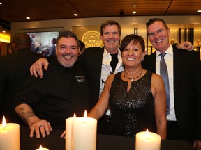 GINO DONATO/THE SUDBURY STAR 
Milestones opens in Sudbury Celebrity chef Jason Rosso, left, was on hand at the new Sudbury Milestones location Wednesday night for a special opening party, with owners Joe, Louise and Mike Sheridan. Joe is the general manager of the new location, which opens for business today at 5 for dinner.