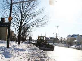 Drivers could see pavement again but there was still work to do clearing deep piles of snow from the edges of the roadways in Goderich on Thurs. Jan. 9.