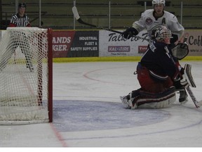 While the Saints were able to get plenty of pucks past Brooks goaltender Michael Frederick they gave up a few too many of their own in a 6-5 OT loss. - Karen Haynes, File Photo