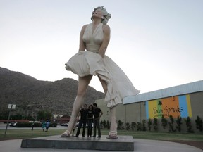 The sculpture "Forever Marilyn" by artist Seward Johnson, based on a scene from the movie "The Seven Year Itch", is on display in Palm Springs, California, in this August 2, 2012 file photo. Two hours east of Los Angeles, the resort area of greater Palm Springs has attracted Hollywood stars and well-heeled retirees for decades, lured by its proximity to both the entertainment capital and the gambling haven of Las Vegas.  REUTERS/Sam Mircovich/Files