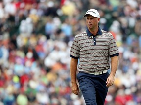 Stewart Cink walks along a fairway during the first round of the 113th U.S. Open in Ardmore, Pa., on June 13, 2013. (Andrew Redington/Getty Images/AFP)