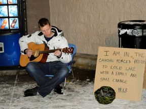 "I can barely pay for my food" Darenn Tremblay, a member of the Canadian Forces Base Cold Lake, was outside a Cold Lake establishment on Jan. 9, 2014 protesting a rent increase on subsidized military housing. Jordan Small/Cold Lake Sun
