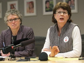 Arlene Wilgosh (right), president and CEO of the Winnipeg Regional Health Authority and Lori Lamont, the WRHA's chief nursing officer, speak at a news conference at the WRHA's office on Main Street on Thu., Jan. 10, 2014, concerning two men who died late in 2013 after being discharged from Grace Hospital and sent home in taxicabs. Kevin King/Winnipeg Sun/QMI Agency