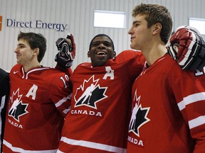 Team Canada PK Subban (C), Alex Pietrangelo (R) and John Tavares horse around after the team photo at the Bell Sensplex in Kanata on Dec 15, 2008. (Andre Forget / QMI Agency)