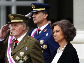 Spain's Crown Prince Felipe (C), King Juan Carlos and Queen Sofia (R) attend an Epiphany Day ceremony at the Royal Palace in Madrid. 
REUTERS/Gerard Julien