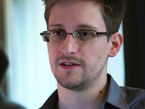 NSA whistleblower Edward Snowden, an analyst with a U.S. defence contractor, is seen in this still image taken from video during an interview by The Guardian in his hotel room in Hong Kong June 6, 2013. (REUTERS/Glenn Greenwald/Laura Poitras/Courtesy of The Guardian/Handout via Reuters)