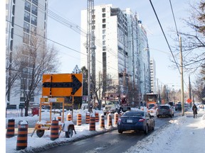 Things should be getting back to normal soon on a stretch of London?s Richmond. St. N., where two lanes have been closed to traffic since early last summer during construction of a 19-storey apartment building. (DEREK RUTTAN, The London Free Press)