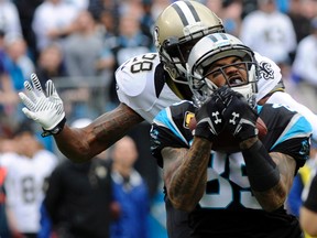 Carolina Panthers wide receiver Steve Smith (89) makes a reception while defended by New Orleans Saints cornerback Keenen Lewis (28) during the first quarter of the game at Bank of America Stadium on Dec 22, 2013 in Charlotte, NC, USA. (Sam Sharpe/USA TODAY Sports)