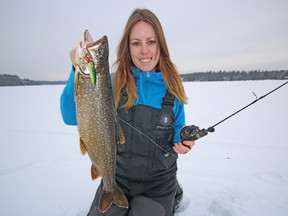 Ashley Rae holds a lake trout caught in the Land O' Lakes region. (Supplied photo)