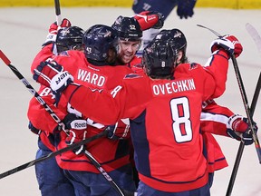 Washington Capitals right wing Joel Ward (42) celebrates with teammates after scoring a goal against the Toronto Maple Leafs in the third period at Verizon Center. The Capitals won 3-2.(Geoff Burke-USA TODAY Sports)