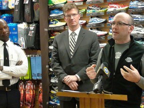 Winnipeg police Patrol Sargeant Nick Pault (right) announces details of the WPS Half-Marathon Friday with Justice Minister Andrew Swan and police Chief Devon Clunis (left). (TOM BRODBECK/WINNIPEG SUN/QMI AGENCY)