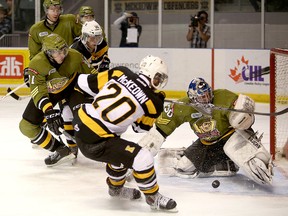 Kingston Frontenacs Roland McKeown pinches in but is stopped by North Bay Battalion goalie Brendan O'Neil during Ontario Hockey League action at the Rogers K-Rock Centre on Friday November 1  2013 IAN MACALPINE/KINGSTON WHIG-STANDARD/QMI AGENCY