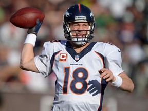 Broncos QB Peyton Manning throws a pass during Week 17. (USA TODAY SPORTS)