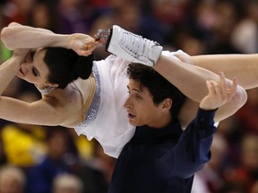 Tessa Virtue and Scott Moir perform in the senior dance free program at the Canadian Figure Skating Championships in Ottawa January 11, 2014. 
REUTERS/Chris Wattie