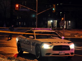 Peel police at the scene of a fatal hit and run at the intersection of Morning Star Drive and Goreway Drive in Mississauga Saturday, Jan. 11, 2014. (Jayson Mills photo)