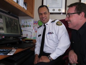Deputy Toronto Police Chief Peter Sloly (in white) and social media policing expert Const. Scott Mills. (IAN ROBERTSON PHOTO)