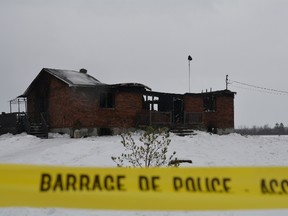 Two people died after a home at 3122 Wilson Rd. in Quebec's Pontiac municipality was gutted by fire Saturday, Jan. 11, 2014. Police are investigating the blaze but don't believe it was suspicious. CHRIS HOFLEY/QMI AGENCY