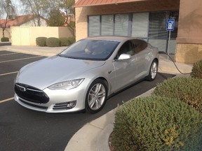 A Tesla electric car charging up. (SUPPLIED)