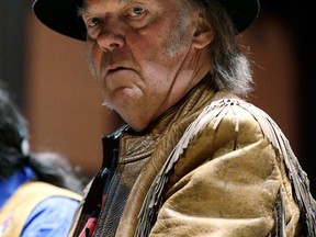 Neil Young is pictured Sunday at a Toronto press conference where he went on the offensive against oilsands development in Alberta. (CRAIG ROBERTSON, Toronto Sun)