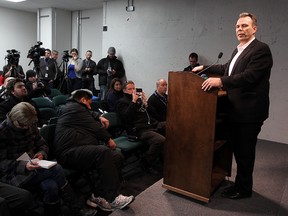 Winnipeg Jets general manager Kevin Cheveldayoff (r) announces the firing of head coach Claude Noel during a press conference in Winnipeg, Man. Sunday January 12, 2014.
Brian Donogh/Winnipeg Sun/QMI Agency