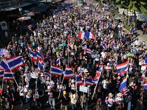 Anti-government protestors march in central Bangkok January 13, 2014.  . REUTERS/Nir Elias