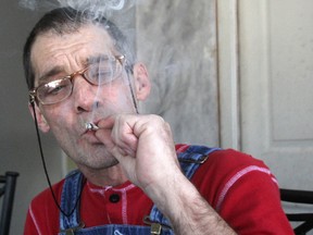 Jeff Johnston smokes marijuana. (TYLER KULA, The Observer)