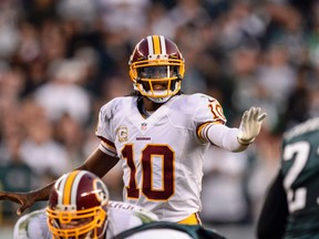 Washington Redskins quarterback Robert Griffin III (10) calls signals at the line of scrimmage during NFL action against the Philadelphia Eagles at Lincoln Financial Field. (Howard Smith/USA TODAY Sports)