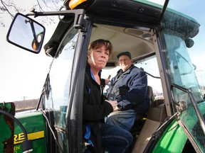 Lisa Gibson is an activist and supporter of long-time Quinte West farmer Frank Meyers. The two are seen here at Meyers' farm during a protest held in January 2014. - FILE PHOTO BY JEROME LESSARD/The Intelligencer/QMI Agency