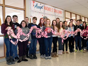 CHRIS ABBOTT/TILLSONBURG NEWS
Students from Pam Demaree's Leadership class at Glendale High School display the school's Chain of Kindness, a chain of paper links created by nearly 800 students promoting kindness.