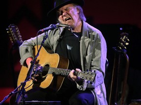 Neil Young in concert at Massey Hall in Toronto, Ont. on Sunday January 12, 2014. (Craig Robertson/QMI Agency)