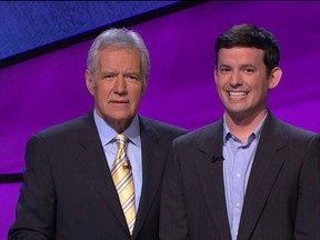 Alex Trebek of Jeopardy with contestant Matthew Church, a med student at Queen's University.