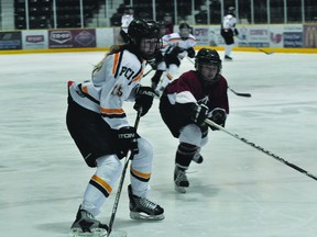 PCI Saints' McKenzie Van Aert handles the puck during the Saints' 6-5 win over College Beliveau Jan.13. (Kevin Hirschfield/THE GRAPHIC/QMI AGENCY).