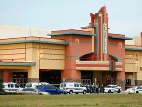 Police tape surrounds the Cobb Grove 16 movie theatre in Wesley Chapel, Florida, January 13, 2014. (MIKE CARLSON/REUTERS)