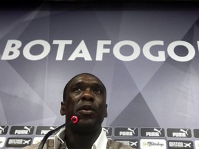 Dutch soccer player Clarence Seedorf talks during a news conference in Rio de Janeiro January 14, 2014. (REUTERS/Ricardo Moraes)