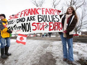 London, Ont. resident Tina Jensen, right and Margaret Collin of Milford, Ont. express their support for Quinte West farmer Frank Meyers in January 2014. - FILE PHOTO BY JEROME LESSARD/The Intelligencer/QMI Agency