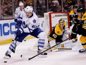 Toronto Maple Leafs left wing Nikolai Kulemin (41) controls the puck in front of Boston Bruins goalie Tuukka Rask (40) during the first period at TD Banknorth Garden Jan 14, 2014, in Boston. (Greg M. Cooper-USA TODAY Sports/Reuters)