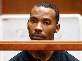 Former Los Angeles Lakers guard Javaris Crittenton appears in Los Angeles Superior Court for an extradition hearing with attorney Brian Steel in downtown Los Angeles August 31, 2011. (REUTERS/Al Seib/Pool)