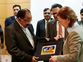 Alberta Premier Alison Redford meets with India's Minister of Petroleum and Natural Gas, Dr. Veerappa Moily, at the Petrotech 2014 oil and gas exhibition just outside New Delhi, India on Wednesday Jan. 15, 2014. Photo Supplied/Alberta International and Intergovernmental Relations