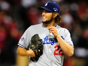 Los Angeles Dodgers starting pitcher Clayton Kershaw reacts during the third inning against the St. Louis Cardinals in game six of the National League Championship Series baseball game at Busch Stadium on Oct 18, 2013 in St. Louis, MO, USA  (Jeff Curry/USA TODAY Sports)